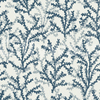 Teal botanical coral structures on a neutral base with oceanic wallpaper.
