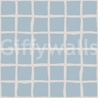 Boho Coastal Grid wallpaper swatch with painterly cream lines on soft blue squares., GD9913