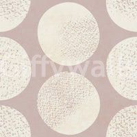 Polka dot wallpaper showing cream stippled circles on dusty rose field.
