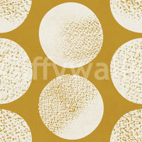 Warm mustard wallpaper with cream circles featuring intricate gold speckled pattern detail. 