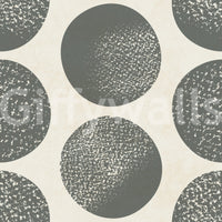 Geometric wallpaper featuring stippled circles in slate grey and cream base.