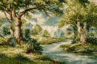 Nature scene wall mural with a winding blue river and lush forest plants.