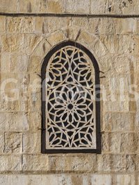 Beige sandstone texture with geometric lattice detail in Moorish wall mural., GD10440