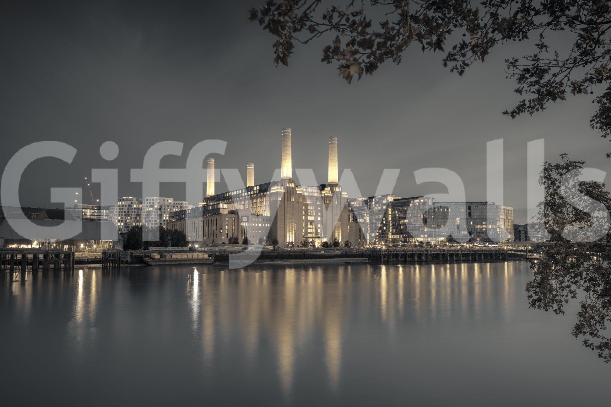 Grey cityscape mural with four illuminated chimneys above a waterfront building., GD10468