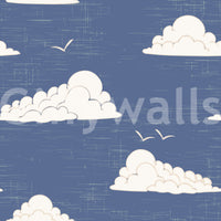 Wall mural showing dusty blue sky with white clouds and birds.