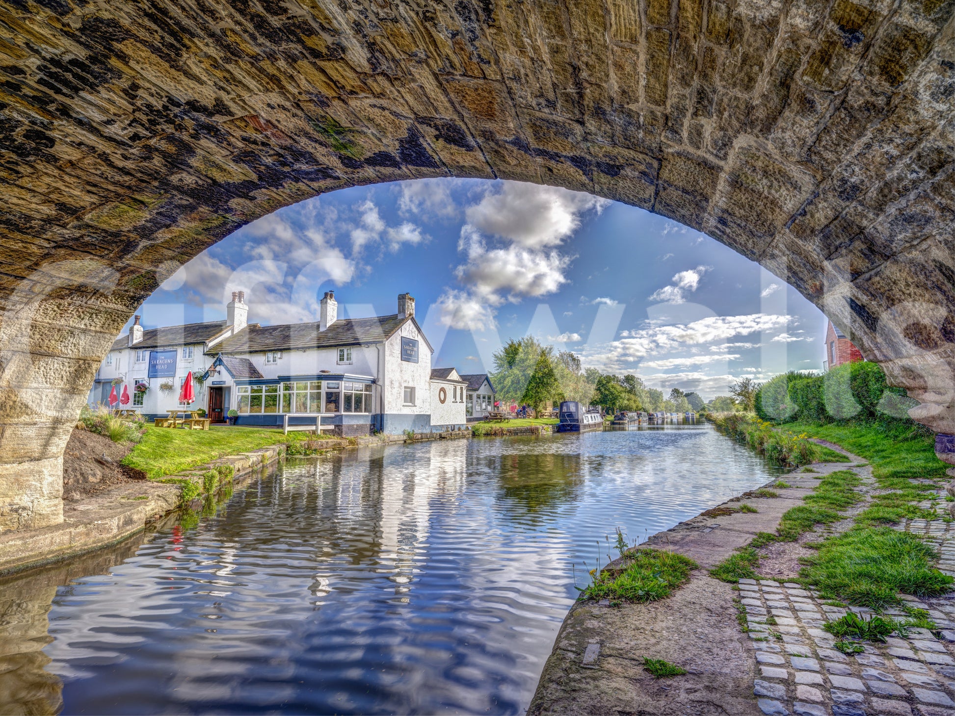 Stone Archway Waterside View Wall Mural