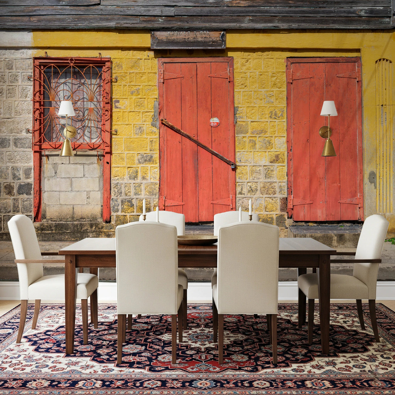 Dining room with Weathered Brick and Red Doors Wall Mural behind a wood table