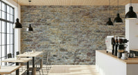 Weathered Stone Brick Wall Mural in a cozy living room setting.