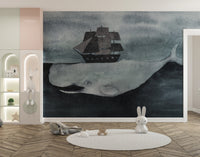 Whale and ship wall design in dark tones
