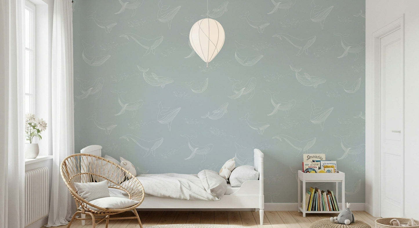 Minimalist living space featuring a blue Aqua Whale Dreams wallpaper.