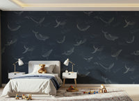 Whale Song Serenade Wall Mural in a creative studio with wooden floors.