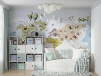 A minimalist home office with the whimsical world map wallpaper.

