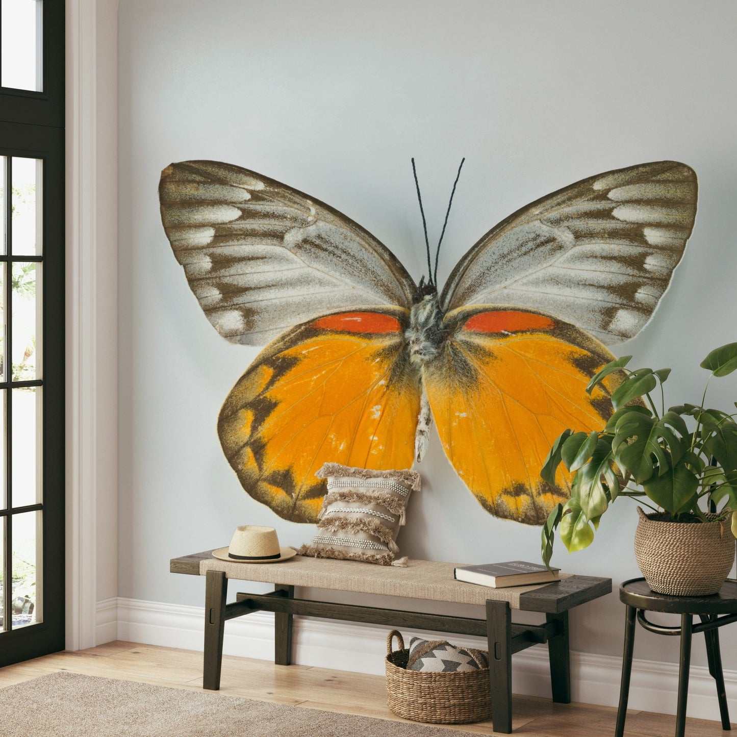 Detailed nature wall mural featuring flying butterflies and leaves.