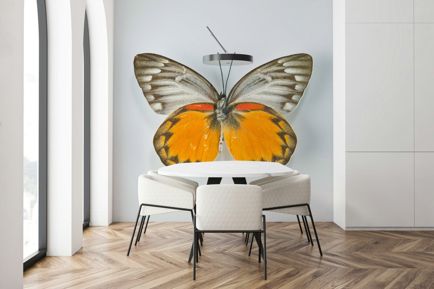 Delicate butterfly pattern wallpaper with soft blue and pink tones.