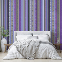Wallpaper with various vertical stripes and different patterns.

