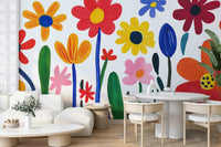 Whimsical interior mural with coral and cobalt flowers

