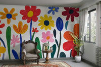 Joyful garden scene mural with bold paper-like blooms

