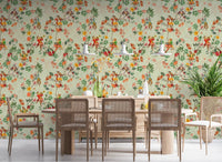 Dining room styled with whimsical monkey garden green wallpaper and woven chairs, GD8595