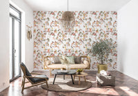 Relaxed sofa space framed by Whimsical Monkeys Playing Music white wallpaper