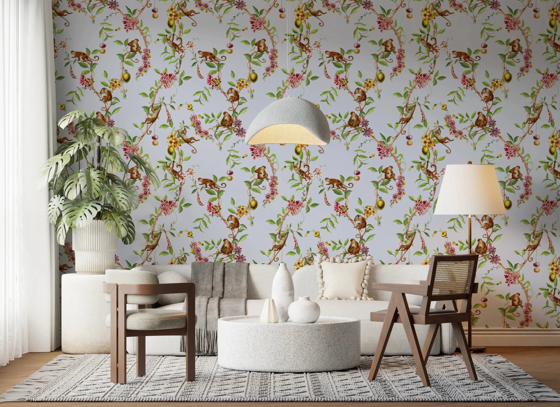 Open lounge space shaped by vintage monkey garden blue wallpaper and leafy branches