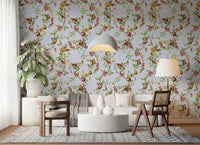 Open lounge space shaped by vintage monkey garden blue wallpaper and leafy branches