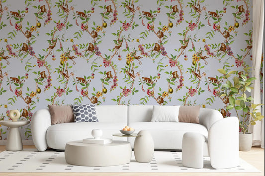 A soft living area paired with monkey garden blue wallpaper and airy botanical vines