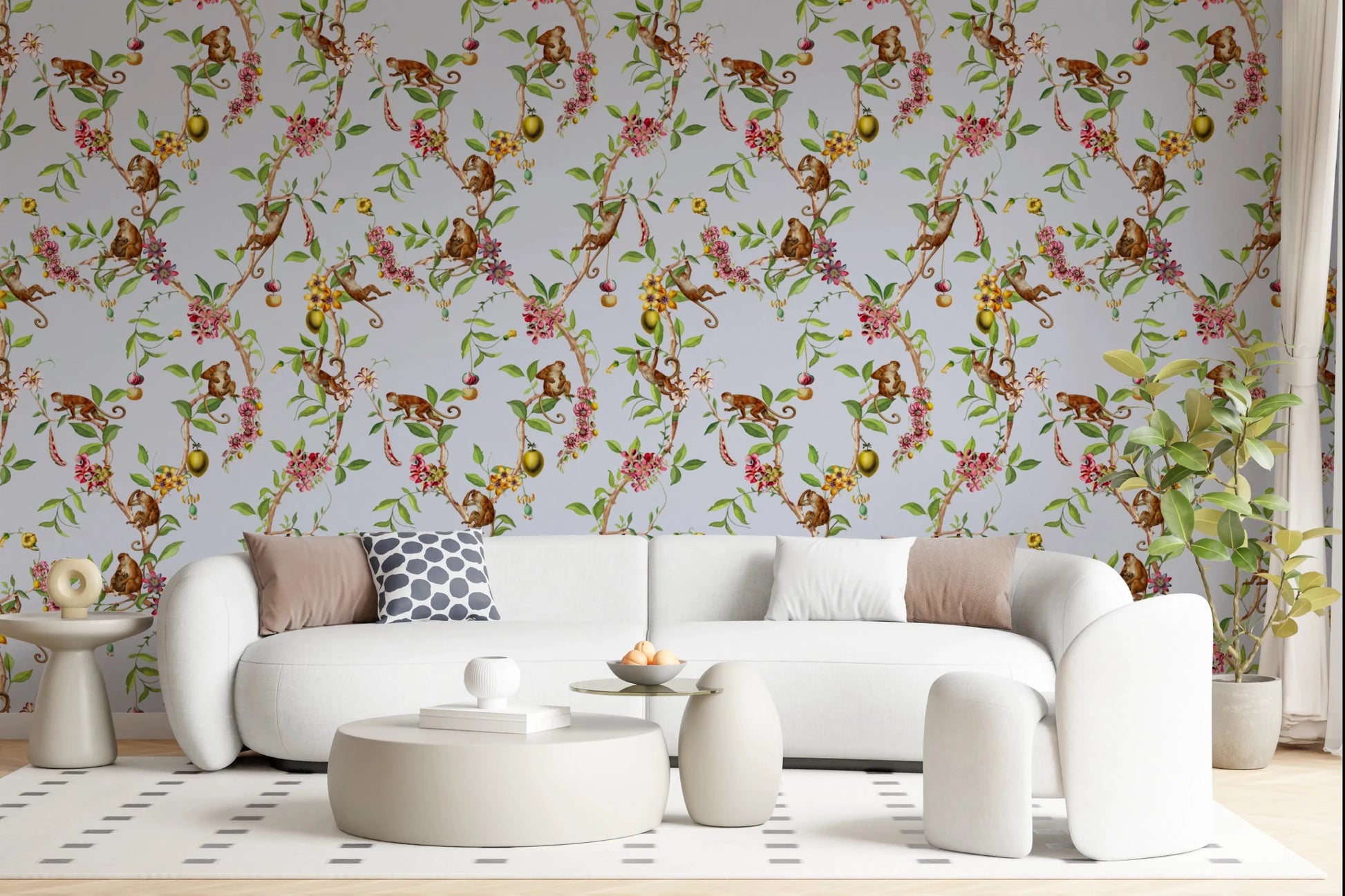 A soft living area paired with monkey garden blue wallpaper and airy botanical vines