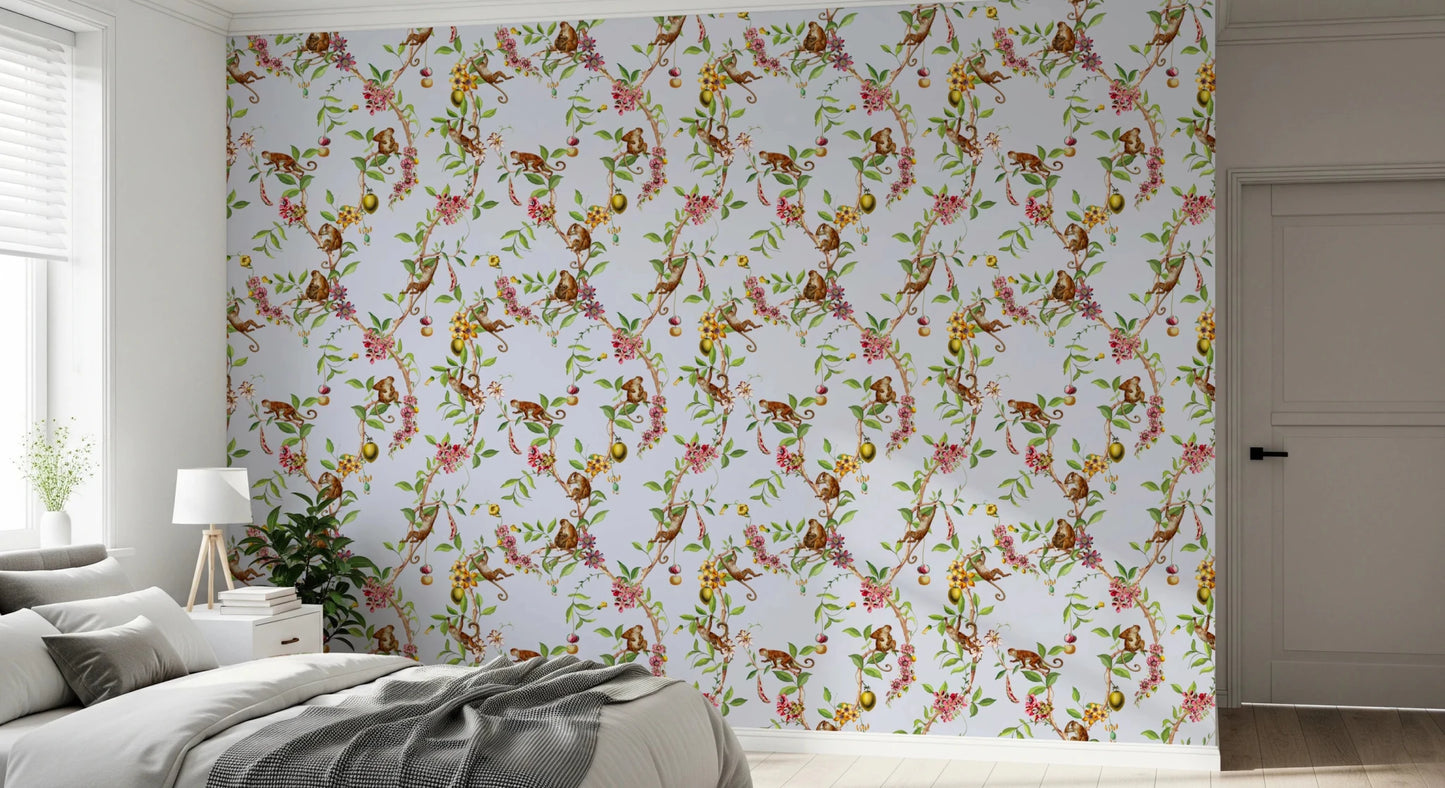 Cozy bedroom atmosphere defined by exotic monkey blue wallpaper and branch motifs