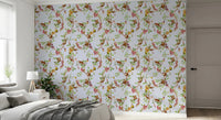 Cozy bedroom atmosphere defined by exotic monkey blue wallpaper and branch motifs
