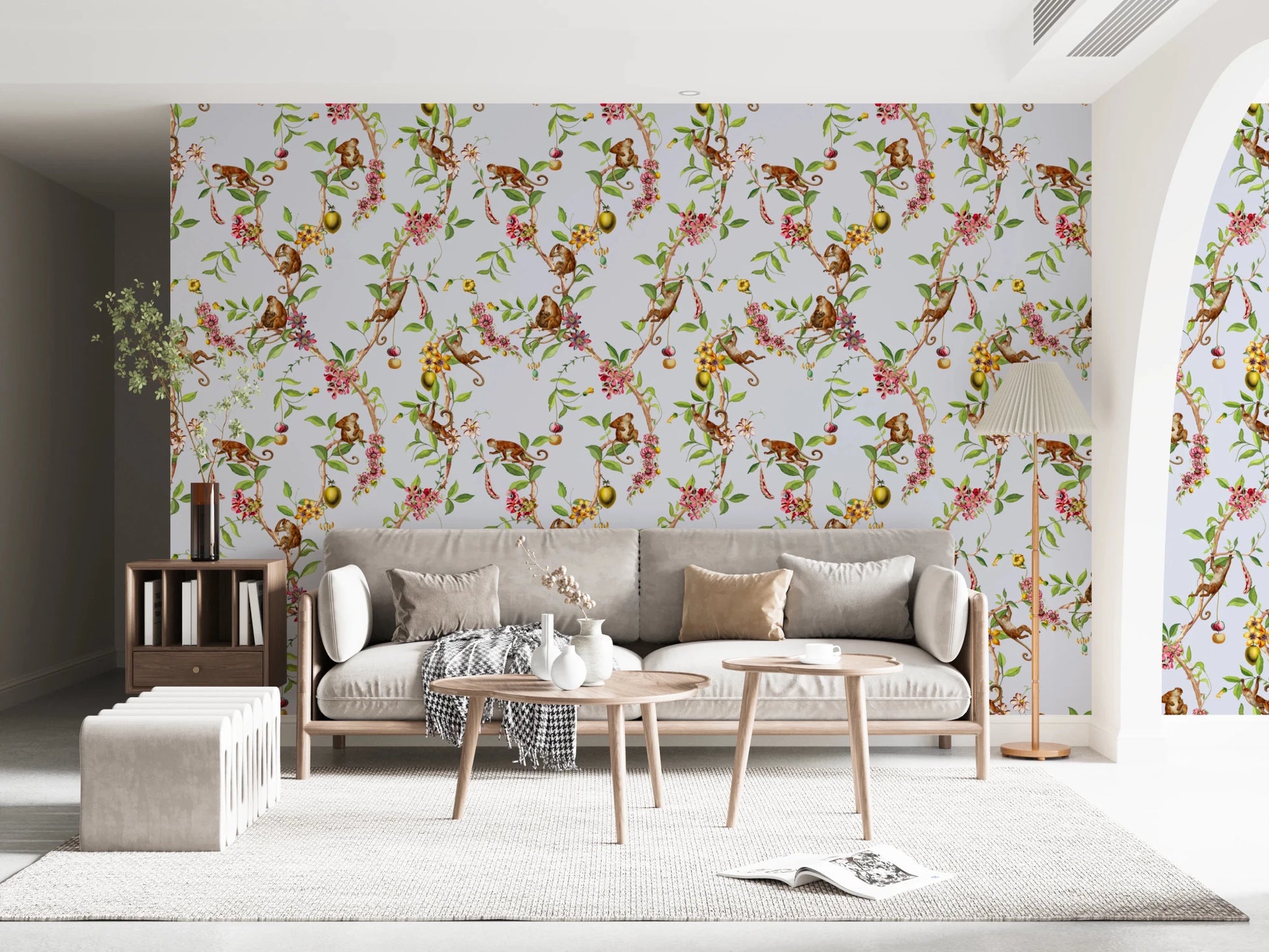 Bedside view where monkey family blue wallpaper creates a calm floral backdrop