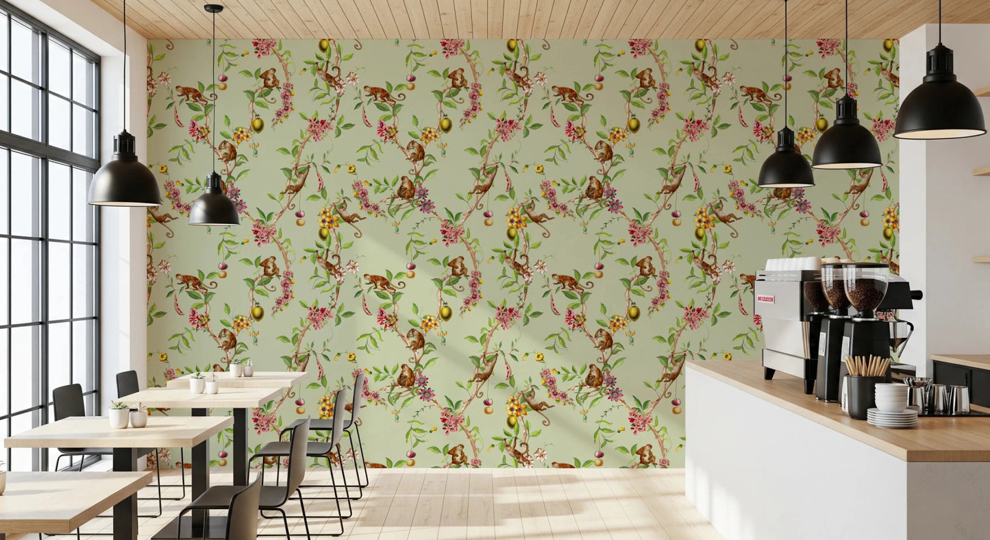 Cafe wrapped in whimsical monkey garden green wallpaper with soft florals

