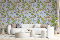Calm interior corner featuring blue vineyard monkey wallpaper with scattered leaf forms, GD8590