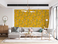 High-style living room with a gold chandelier and  Monkeys Vineyard Yellow wallpaper.