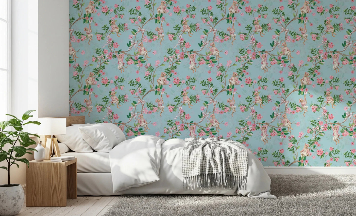 Bedroom softened by whimsical rococo monkey wallpaper and pink flower trails