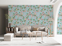 Relaxed family lounge featuring vintage monkey vineyard wallpaper in a soft blue tone