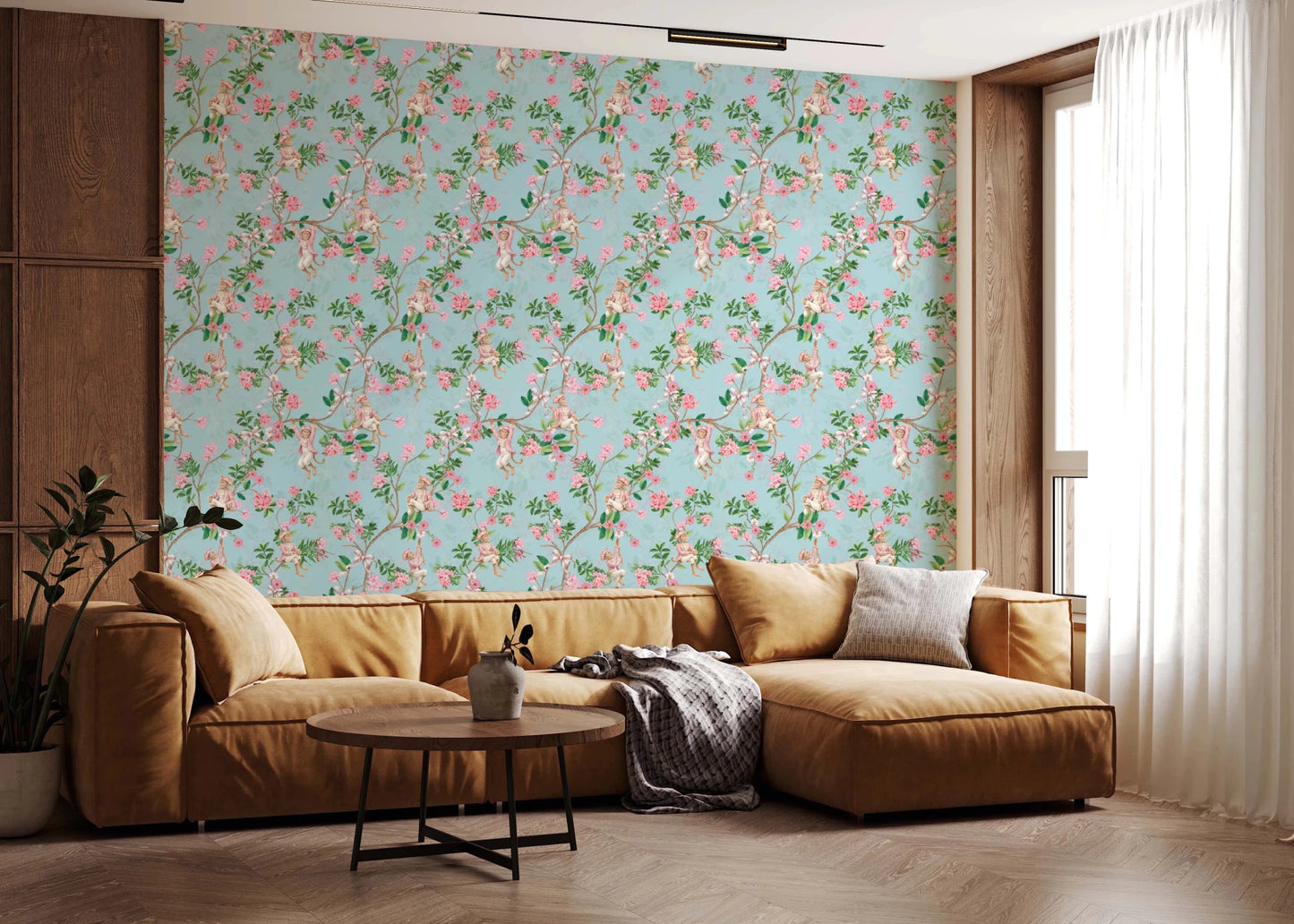 Warm lounge corner framed by whimsical garden party wallpaper on a pale blue 