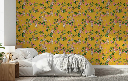 Bedroom brightened by rococo monkey party yellow wallpaper with pink blossoms