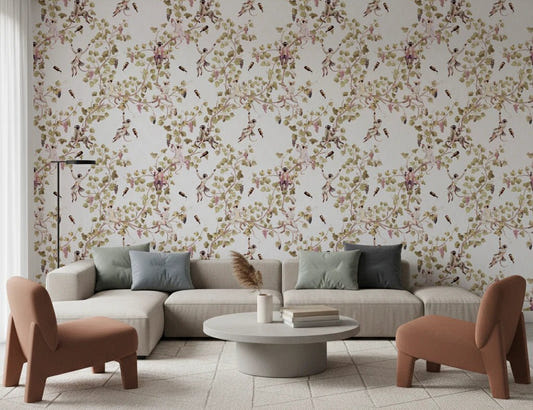 A soft living room styled with vineyard monkey wallpaper and warm neutral seating tones