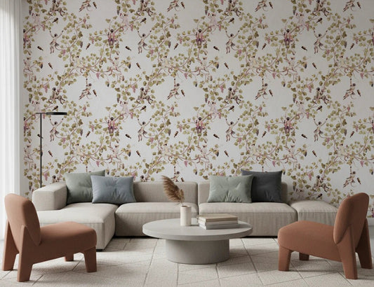 A soft living room styled with vineyard monkey wallpaper and warm neutral seating tones