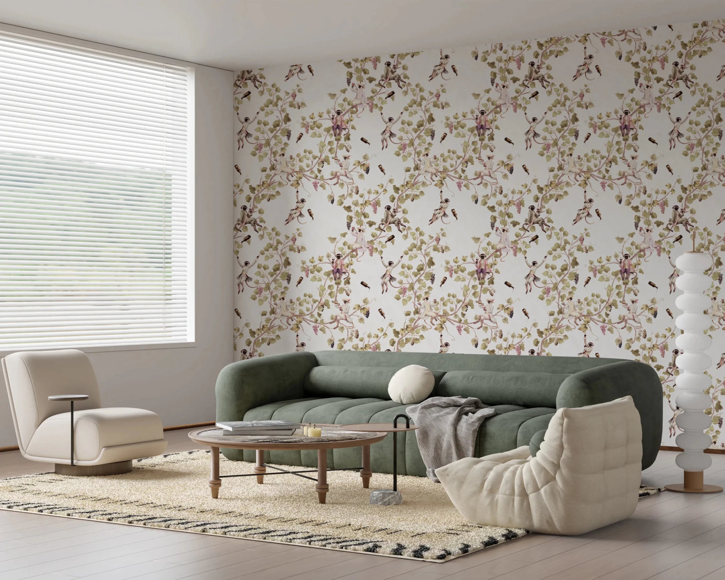 Comfortable seating zone featuring vineyard monkey wallpaper and soft botanical spread
