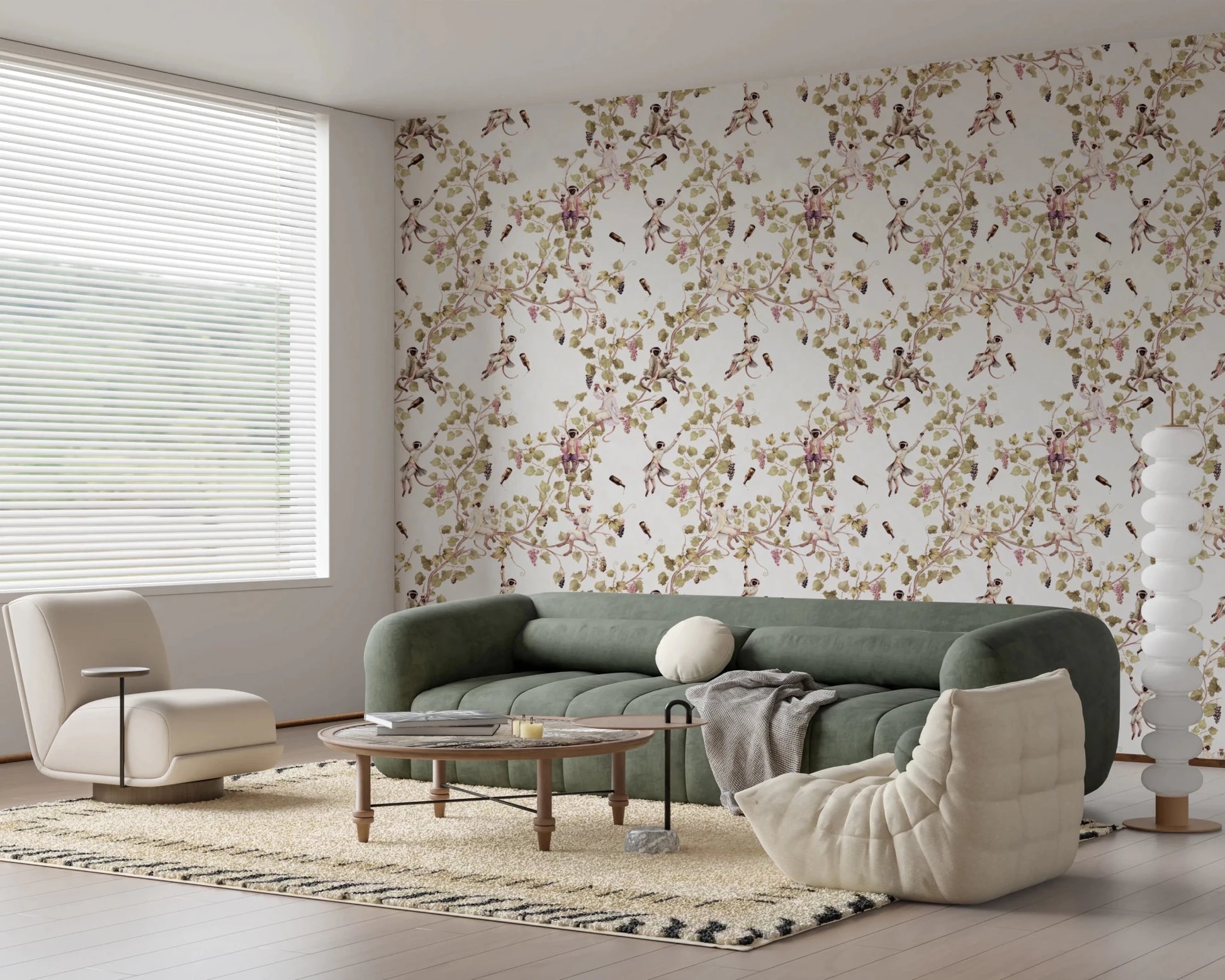 Comfortable seating zone featuring vineyard monkey wallpaper and soft botanical spread