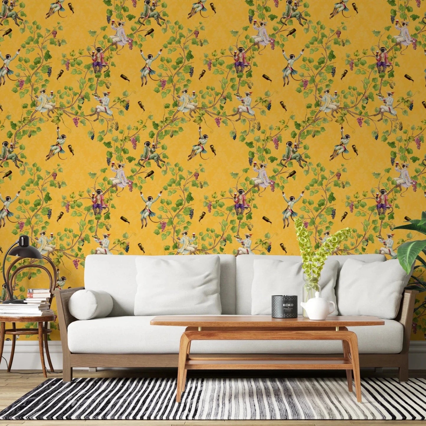 Relaxed sofa area lifted by whimsical rococo yellow wallpaper and leafy branches, GD8580