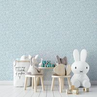 Wall covering with white whimsical flowers

