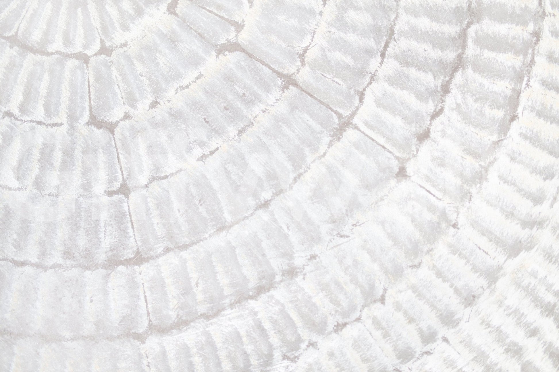 Corner view of a hallway brightened by the soft Whispered Texture wallpaper for walls.