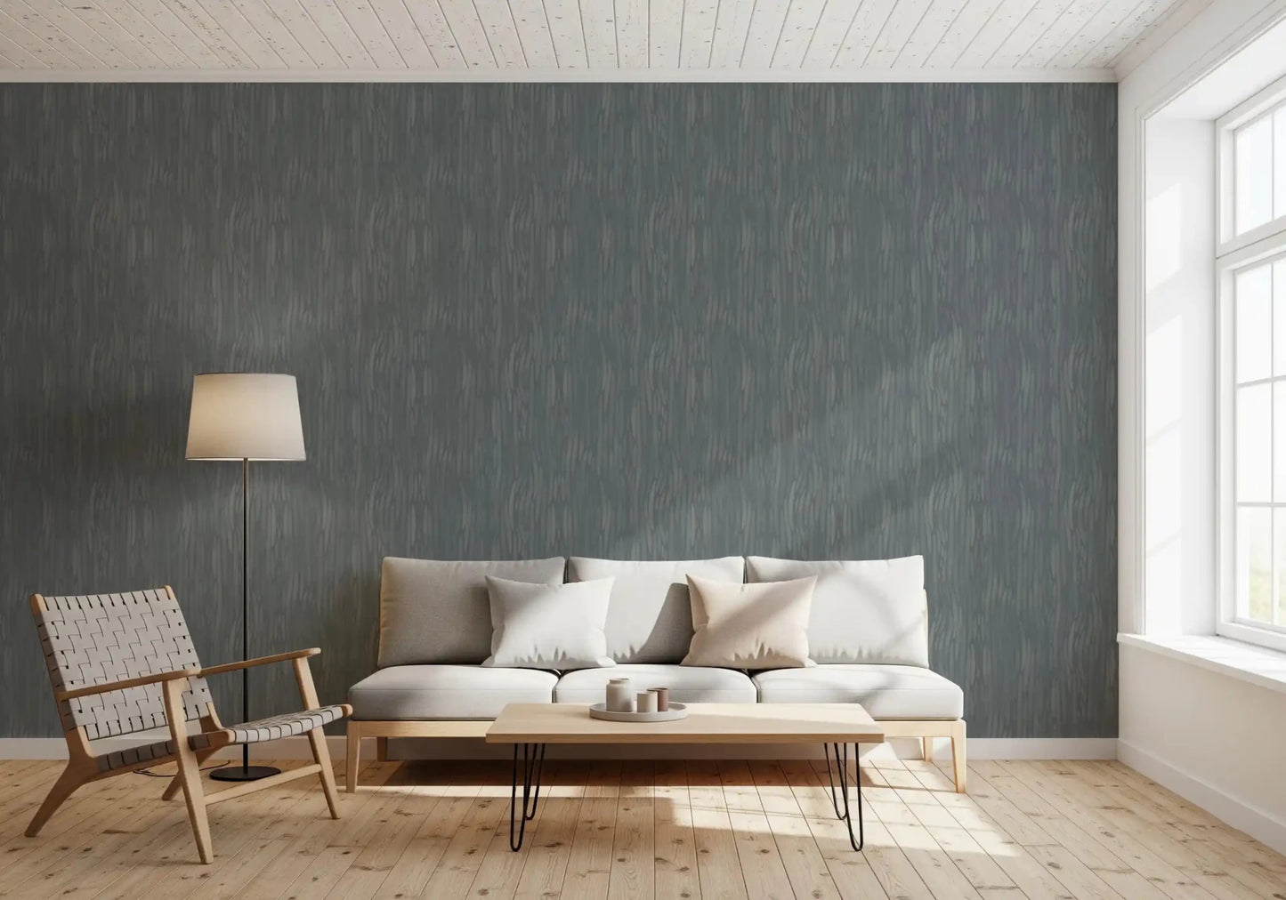 A small lounge corner picks up calm texture through Whispering Greige Waves wallpaper.GD9523