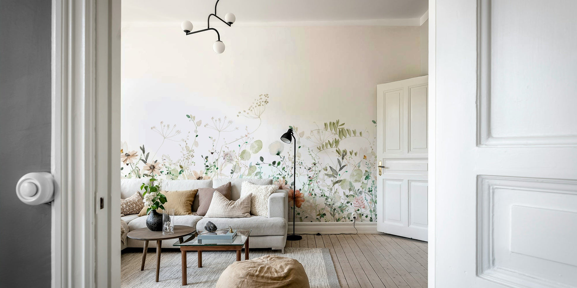 Floral and green meadow mural bringing nature indoors.

