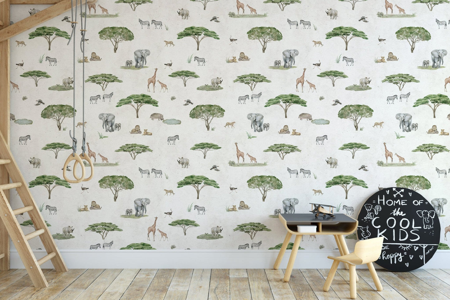 Safari animals and trees on white mural
