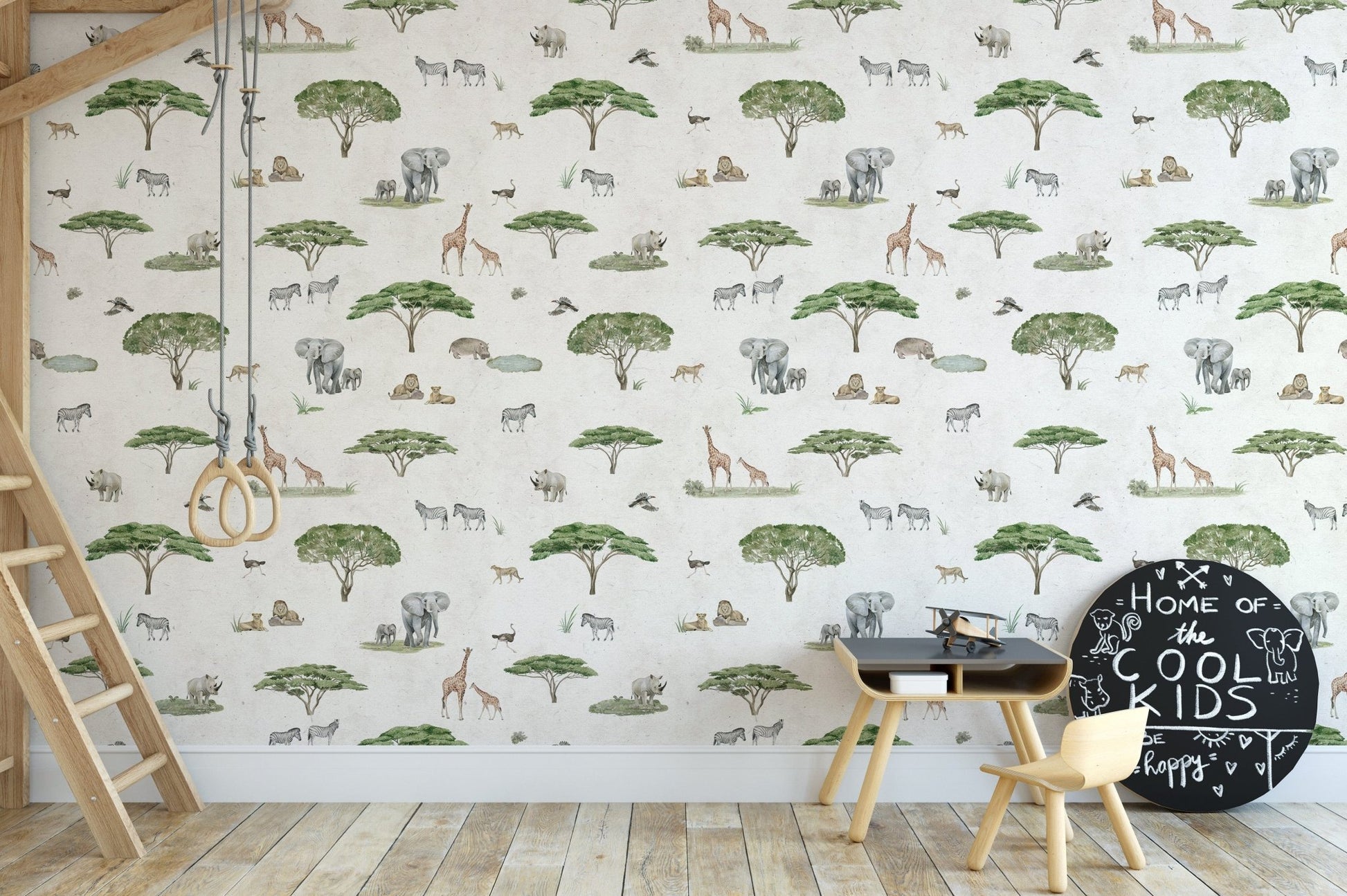Safari animals and trees on white mural
