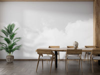 Calm white clouds floating in a gray sky. A769