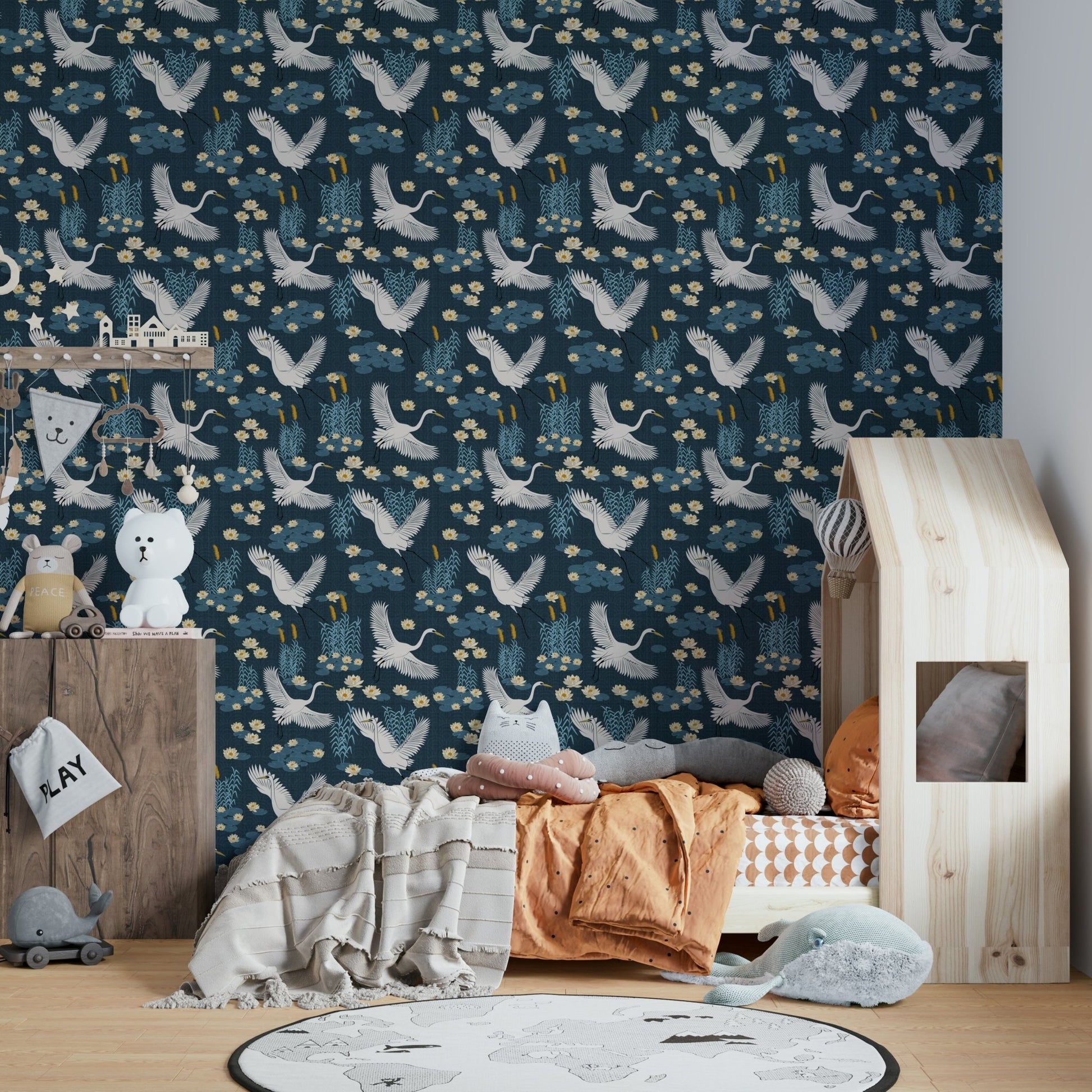 Tranquil lagoon wallpaper in blue with herons

